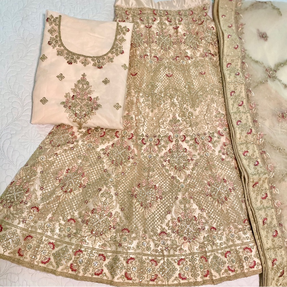 Designer Lehenga Heavily Embroidered with Rhinestones. Dupatta & Unstitched Top